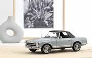 Modellauto- Mercedes Benz 230 SL Bauhjahr 1963 in Grau | Norev 1:18 Automodelle